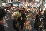 Christmas revellers make the most of the last night of bars being open before London is moved to Tier 3 restrictions.