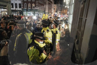 Christmas revellers make the most of the last night of bars being open before London is moved to Tier 3 restrictions.