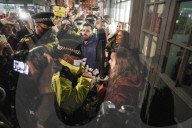 Christmas revellers make the most of the last night of bars being open before London is moved to Tier 3 restrictions.