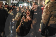 Christmas revellers make the most of the last night of bars being open before London is moved to Tier 3 restrictions.