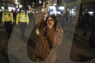 Christmas revellers make the most of the last night of bars being open before London is moved to Tier 3 restrictions.
