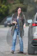 Madeleine Stowe is seen out running errands with her dog in Los Angeles on Saturday afternoon. 