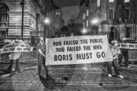 A grassroots campaign, NHS Workers say No, demonstrate in front of Downing Street.