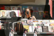 Angelina Jolie shows off a new auburn hairstyle as she heads to the local newsstand with teenage daughter Zahara.