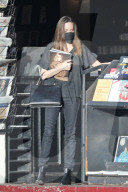 Angelina Jolie shows off a new auburn hairstyle as she heads to the local newsstand with teenage daughter Zahara.
