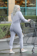 Ariel Winter braves the LA rain as she steps out to pick up groceries and ice cream from Baskin Robbins.