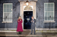Boris Johnson and Carrie Clap for Captain Sir Tom