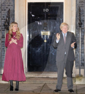 Boris Johnson and Carrie Clap for Captain Sir Tom