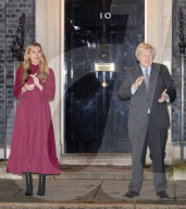 Boris Johnson and Carrie Clap for Captain Sir Tom