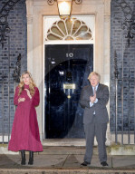 Boris Johnson and Carrie Clap for Captain Sir Tom
