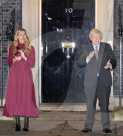 Boris Johnson and Carrie Clap for Captain Sir Tom