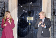 Boris Johnson and Carrie Clap for Captain Sir Tom