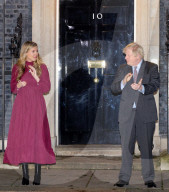 Boris Johnson and Carrie Clap for Captain Sir Tom