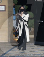 Kourtney Kardashian Slays In Black And White Trench Coat At Nobu