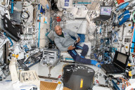 NASA astronaut Victor Glover installs the Fluid Dynamics in Space experiment, or Fluidics for short. 