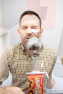 Chain reaction machine artist Joseph Herscher with his inventions at home 