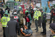 Swampy’s eco-warrior son grinned as he was carried away from the HS2 tunnel underneath London Euston station after 22 days underground.
