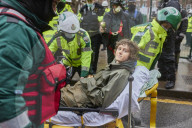 Swampy’s eco-warrior son grinned as he was carried away from the HS2 tunnel underneath London Euston station after 22 days underground.
