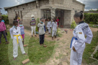 Four chicken heads a dollar: how one Harare grandmother scratches a living in lockdown