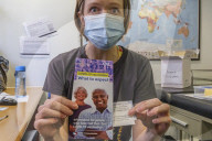 In south London, the covid -19 Pfizer vaccination is given to a patient at the medical practice.