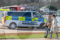 Londoners bask in unseasonally warm weather as UK Covid-19 threat level lowered