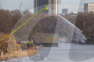 Londoners bask in unseasonally warm weather as UK Covid-19 threat level lowered