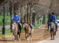 Londoners bask in unseasonally warm weather as UK Covid-19 threat level lowered