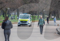 Londoners bask in unseasonally warm weather as UK Covid-19 threat level lowered