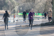 Londoners bask in unseasonally warm weather as UK Covid-19 threat level lowered
