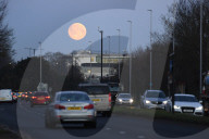 The moon sets near Heathrow this morning.