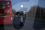 The moon sets near Heathrow this morning.