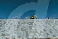 REPORTAGE - 10 Jahre nach dem Tsunami in Japan: 400 km-Schutzwall gegen das Meer