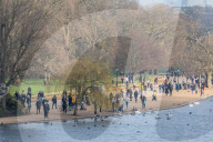 Famillies enjoy the spring weather as police enforce Covid-19 rules.