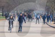 Famillies enjoy the spring weather as police enforce Covid-19 rules.