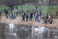 Famillies enjoy the spring weather as police enforce Covid-19 rules.