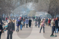 Famillies enjoy the spring weather as police enforce Covid-19 rules.