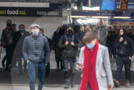 Office workers arrive at Victoria Station in London this morning as Chancellor Rishi Sunak unveils his 2021 Budget. 