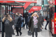 Office workers arrive at Victoria Station in London this morning as Chancellor Rishi Sunak unveils his 2021 Budget. 
