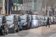 Office workers arrive at Victoria Station in London this morning as Chancellor Rishi Sunak unveils his 2021 Budget. 