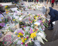 Floral & written tributes for Sarah Everard left by hundreds of Londoners laying flowers at a bandstand in Clapham Common, London.
