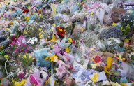 Floral & written tributes for Sarah Everard left by hundreds of Londoners laying flowers at a bandstand in Clapham Common, London.