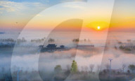 FEATURE -  China: Morgendlicher Nebel über Suqian