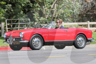 Chris Pine is spotted driving around his vintage Alfa Romeo in Los Feliz.