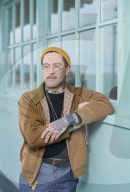 Experience: I tracked down my impostor. I found a video clip of him at a conference, reading out a chapter I’d written. He was dressed like me. He had even copied my tattoos.