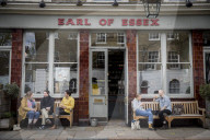 Pubs reopen as lockdown eases and begin serving customers outside.
