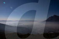 Smoke Haze over Cape Town as fire fighters and helicopters battle with flare ups on day 3 of the Table Mountain Fire.