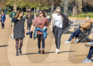 Members of the public enjoy the sunshine in Hyde Park.