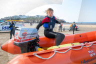 ‘Respect the water’: RNLI lifeguard training in Cornwall. Ahead of a busy summer of domestic tourism in the UK, qualified lifeguards and trainees rehearse life-saving procedures
