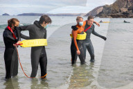‘Respect the water’: RNLI lifeguard training in Cornwall. Ahead of a busy summer of domestic tourism in the UK, qualified lifeguards and trainees rehearse life-saving procedures