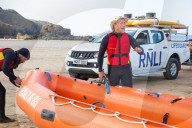 ‘Respect the water’: RNLI lifeguard training in Cornwall. Ahead of a busy summer of domestic tourism in the UK, qualified lifeguards and trainees rehearse life-saving procedures